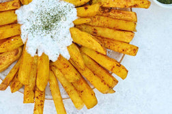 Curry Baked Fries and Dill “Yogurt” Dipping Sauce